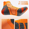 Close-up view of multi-channel river ventilation system ankle socks showing orange and gray colors.