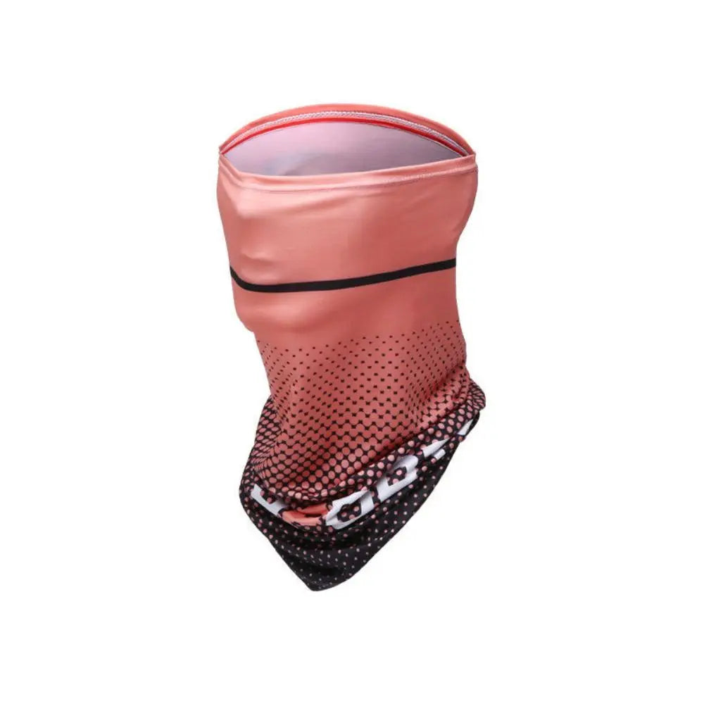 A pink breathable full face sun protection mask with a black trim and dotted fabric texture.