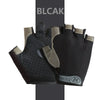 A pair of black fingerless gloves with tan accents shown against a dark background.