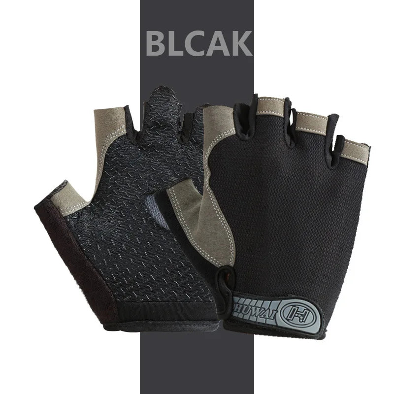 A pair of black fingerless gloves with tan accents shown against a dark background.