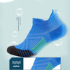 Blue and black performance compression sports socks shown on a foot, highlighting nylon material.