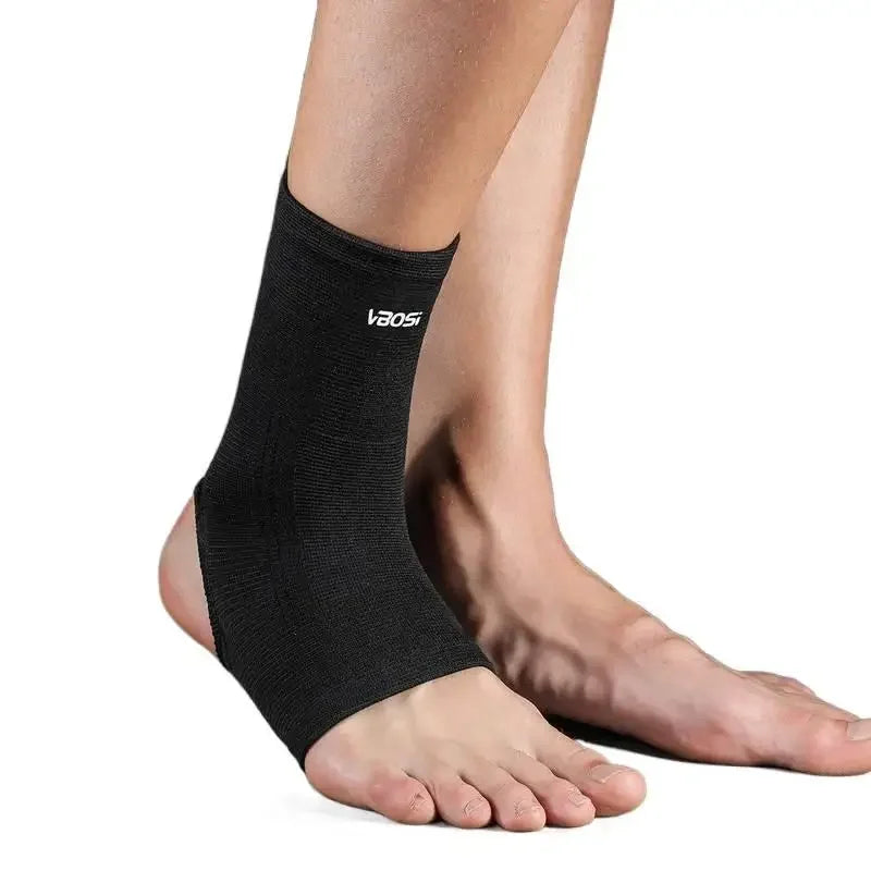Black breathable ankle support brace worn on a person's lower leg.