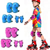A young girl wearing a complete protective gear set for skates and scooters, including helmet, pads, and boots.