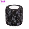 Black elastic bandage tape with a fruit pattern design wrapped around a cylindrical object.