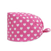 Pink cotton surgical cap with a white heart print