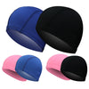 Three swimming caps in blue, pink, and black shown from the side.