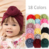 Nahaufnahme von 18 einfarbigen Baumwoll-Baby-Turban-Headwraps