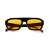 Vintage oversized square sunglasses with a dark brown tortoiseshell frame and amber lenses.