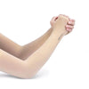A person is wearing a light beige summer ice silk anti-sunburn arm sleeve on their forearm.