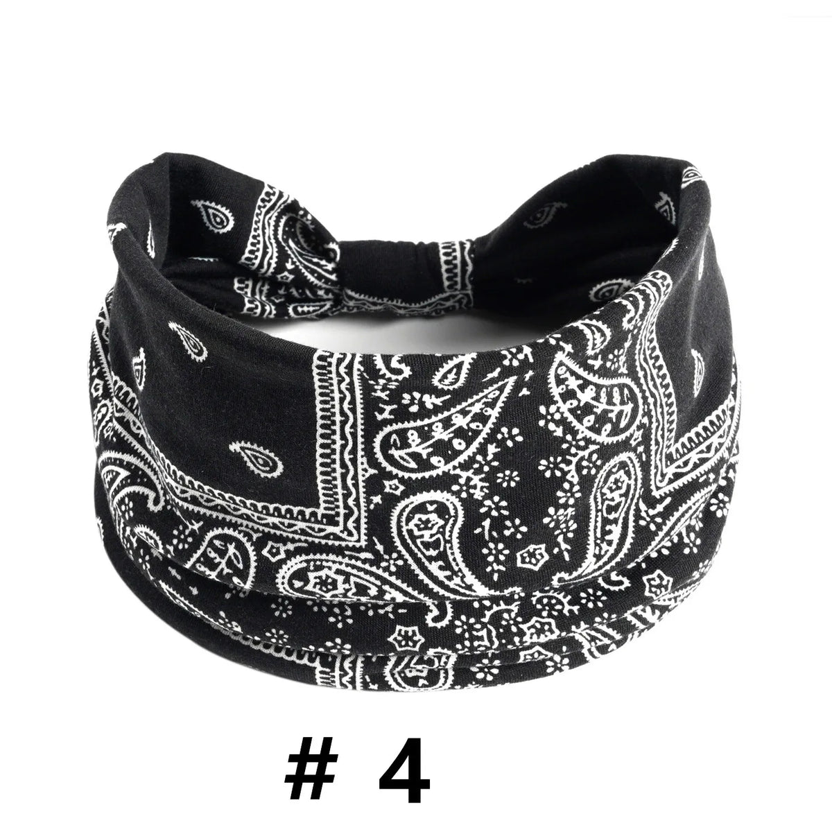 Black cotton boho print headband with intricate white paisley and floral patterns