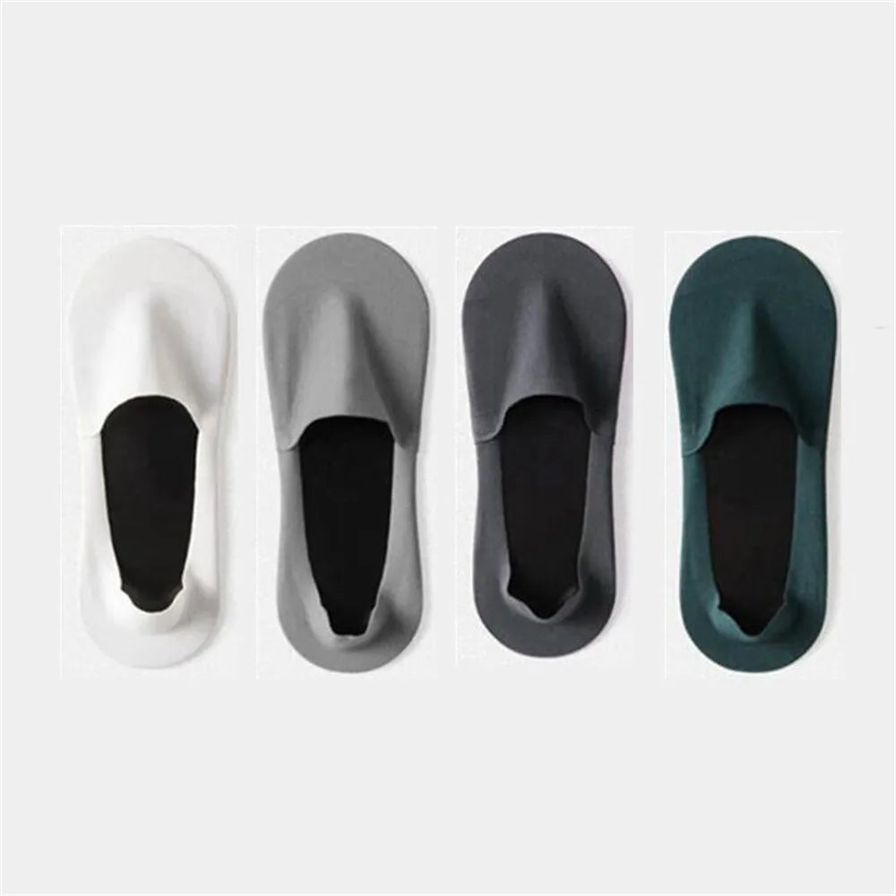 Four pairs of men's invisible boat socks in white, gray, black, and dark green shown from the top view.