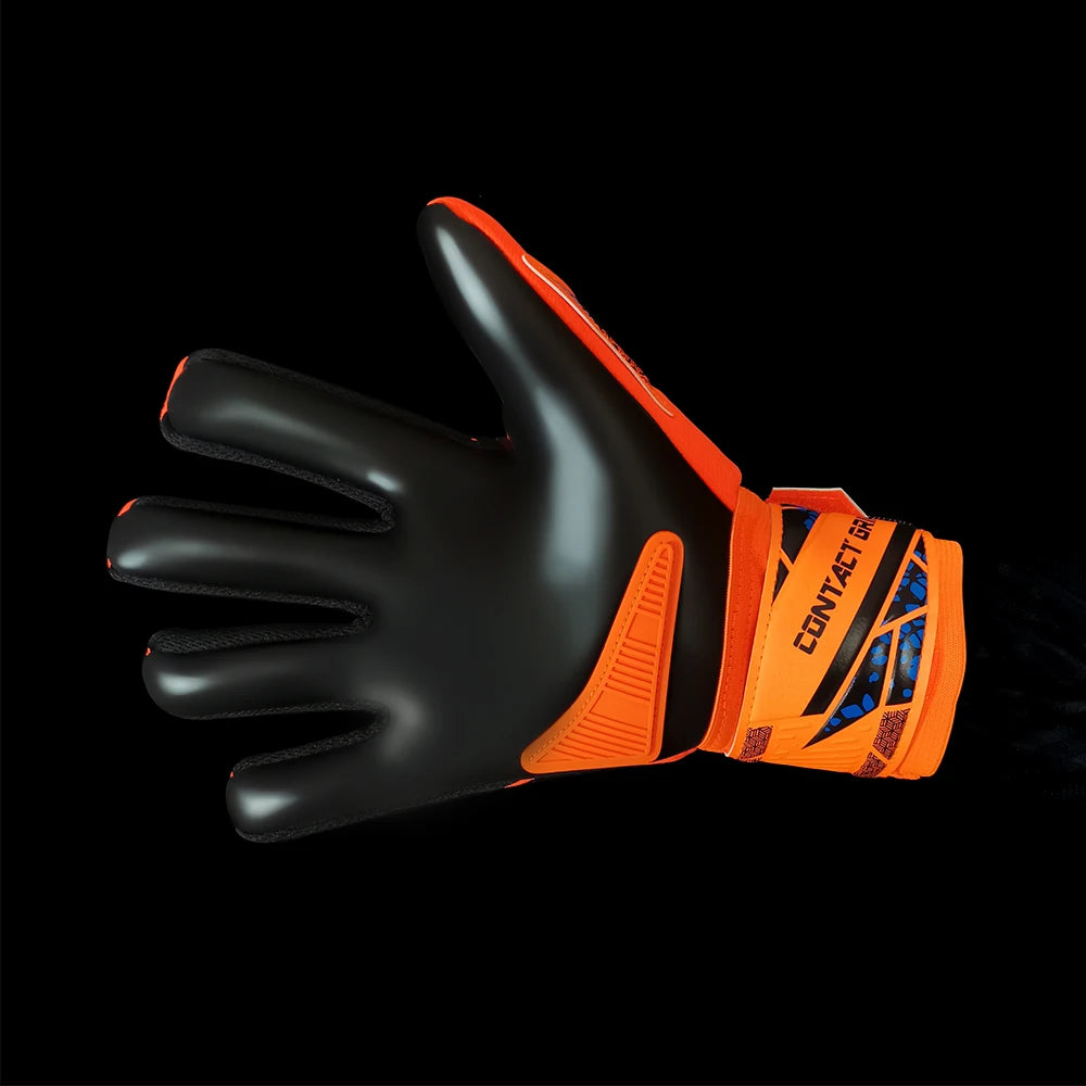 Black and orange latex goalkeeper gloves with a wrist strap shown against a black background.