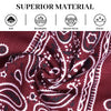 Close-up of a deep maroon boho print cotton fabric showing patterns and texture.