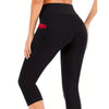 Leggings de yoga capri de cintura alta negras con bolsillo de costura roja en el muslo