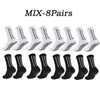 Eight pairs of white athletic grip socks displayed in a row.