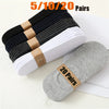 A stack of black and white breathable boat socks is shown next to a gray sock, with a label indicating 20 pairs.