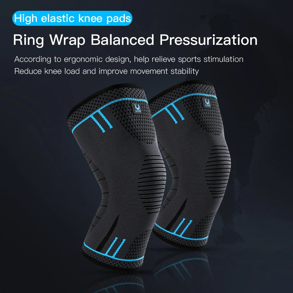 A pair of black elastic knee pads or compression sleeves shown in a close-up view.