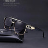 A pair of black retro square sunglasses resting on a black leather case.