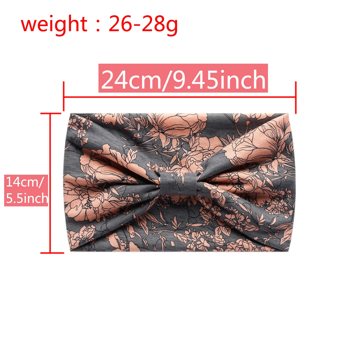 A close-up view of a gray floral print bohemian cotton stretch headband tied in a bow.