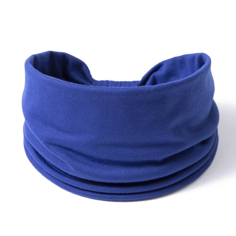 A navy blue boho wide headband hair wrap for women shown flat.