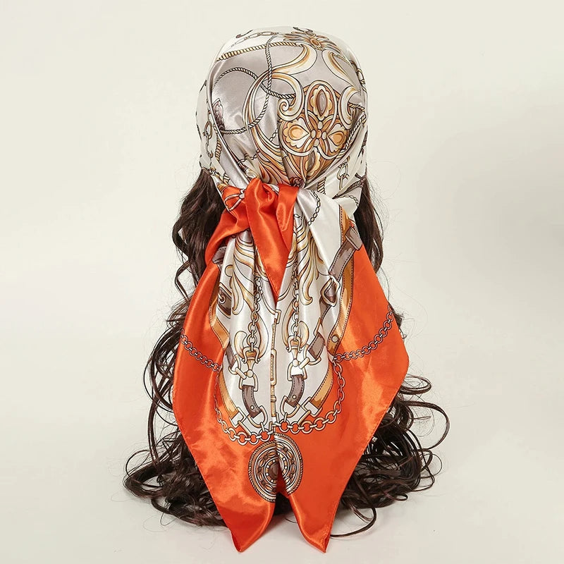 Elegant satin square scarf featuring gold embroidery and chain details for hijab and hair