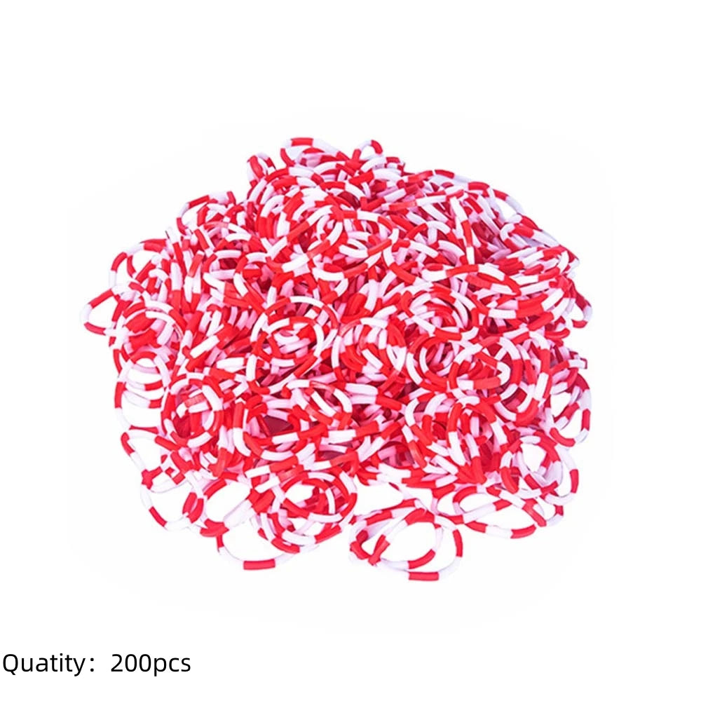 Pila de bandas elásticas rojas y blancas para hacer pulseras