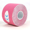 Roll of pink kinesiology tape for athletic recovery