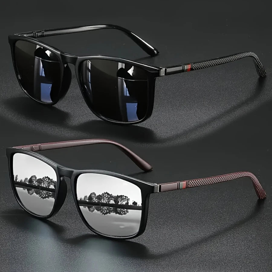 A pair of vintage square sunglasses with dark lenses and brown frames resting on a dark surface.