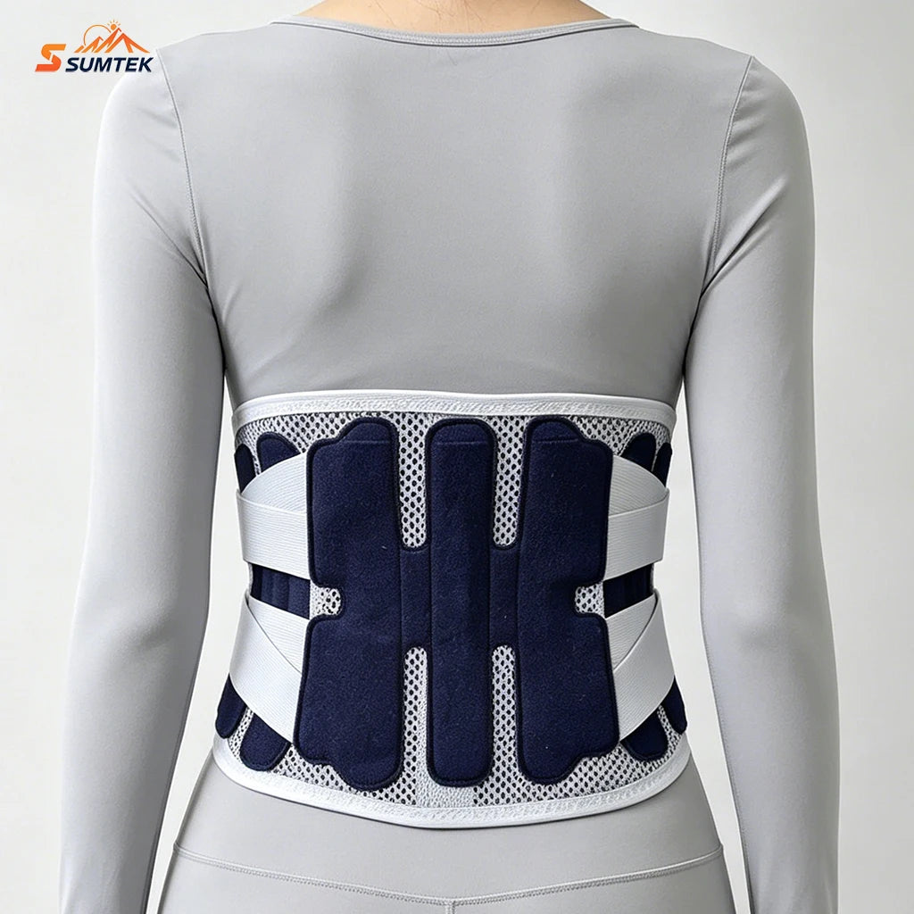 A close-up of a gray, form-fitting back brace with black and white mesh panels for lumbar support.
