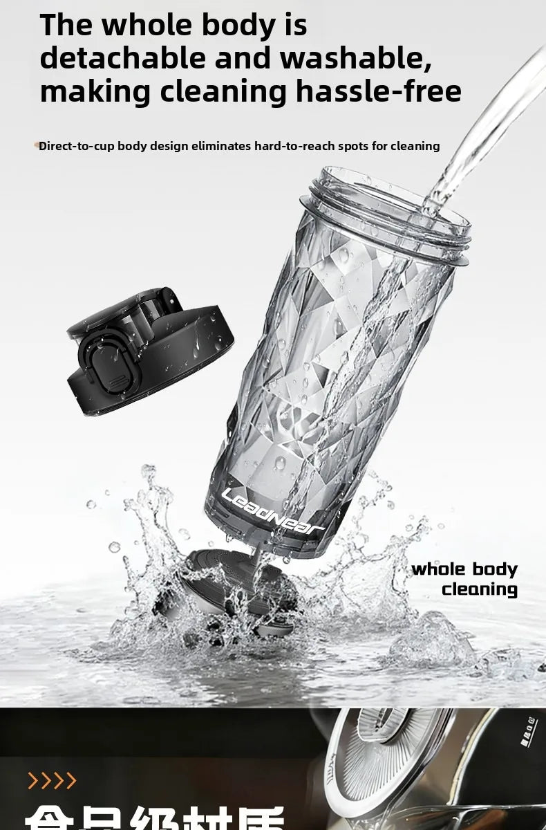 A clear, detachable body shaker bottle is being cleaned with water, demonstrating hassle-free cleaning.