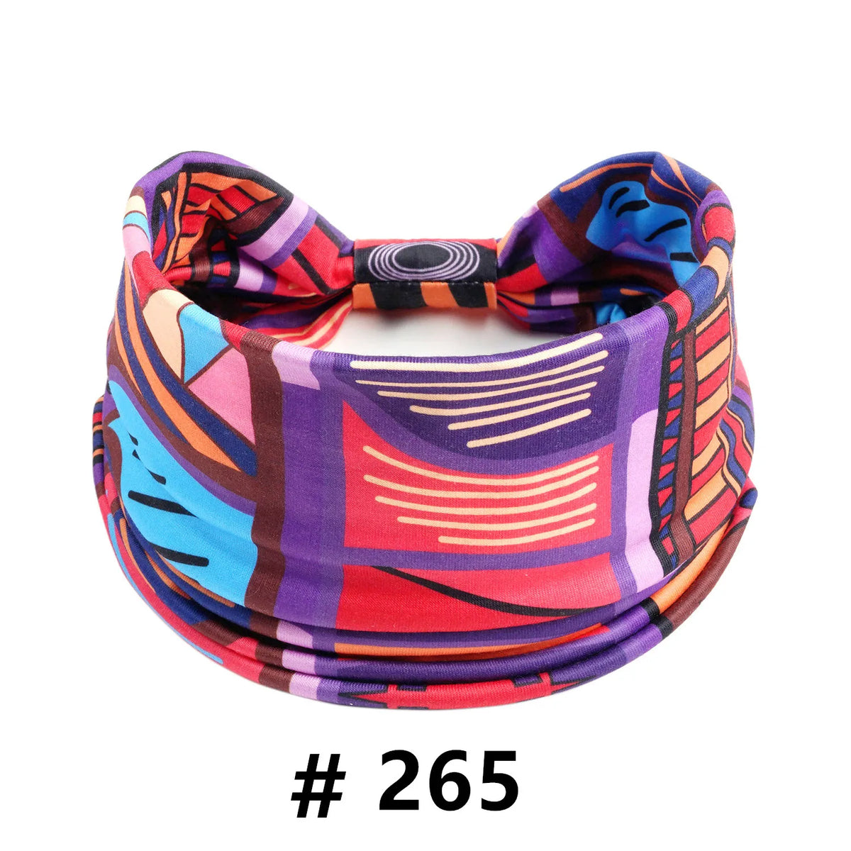 A colorful boho cotton turban headband featuring abstract patterns in purple, pink, blue, and red.