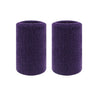 A pair of dark purple dual sports wristbands for sweat absorption.