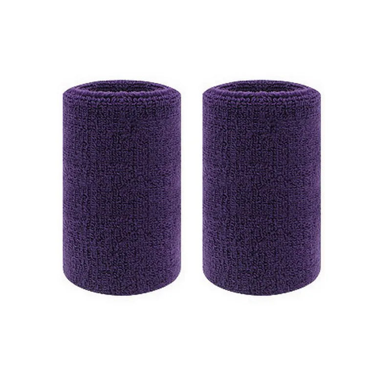 A pair of dark purple dual sports wristbands for sweat absorption.