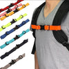 Various colored adjustable tactical backpack strap harnesses displayed against a person's shirt.