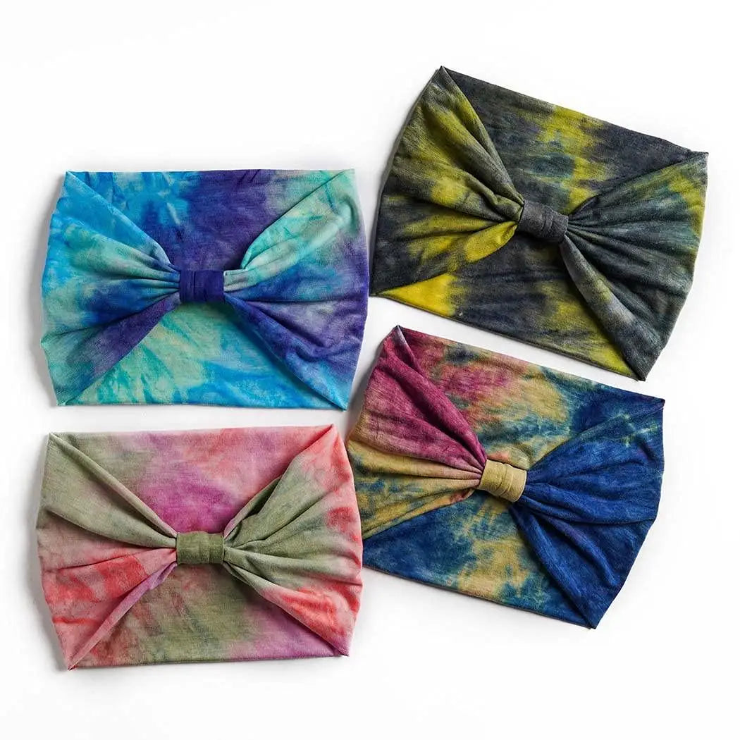 Trois bandeaux de tête en coton tie-dye bleu, violet et vert.