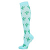Light blue compression socks with a pattern of green cacti.