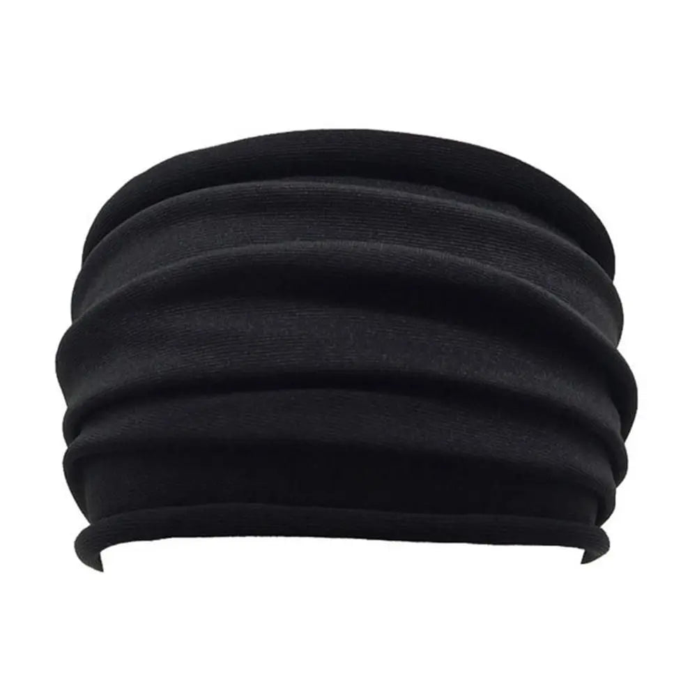 Étoffe noire pour cheveux ou bandeau avec texture côtelée.