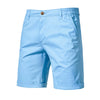 Light blue men's summer cotton casual shorts with a button closure