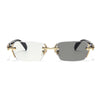 Frameless photochromic prescription glasses with gold accents and gray lenses