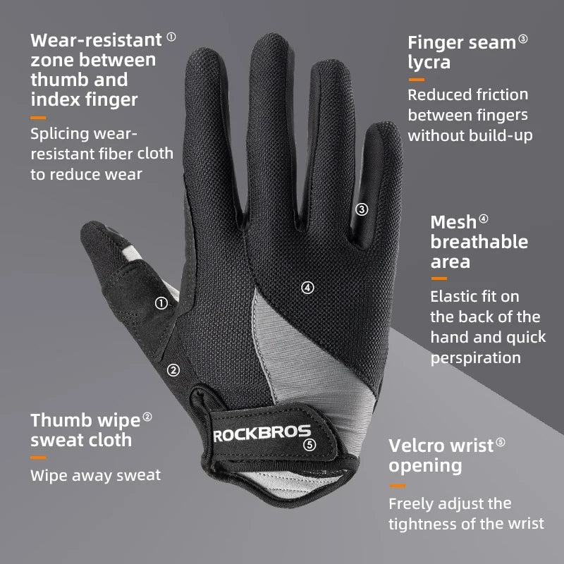 A close-up view of black windproof cycling gloves showing various features like finger seams and wrist openings.