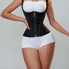 A woman models a black body shaper corset vest top with a white bust and matching white briefs.