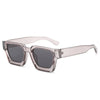 Clear pink retro square frame sunglasses with dark lenses and light pink arms