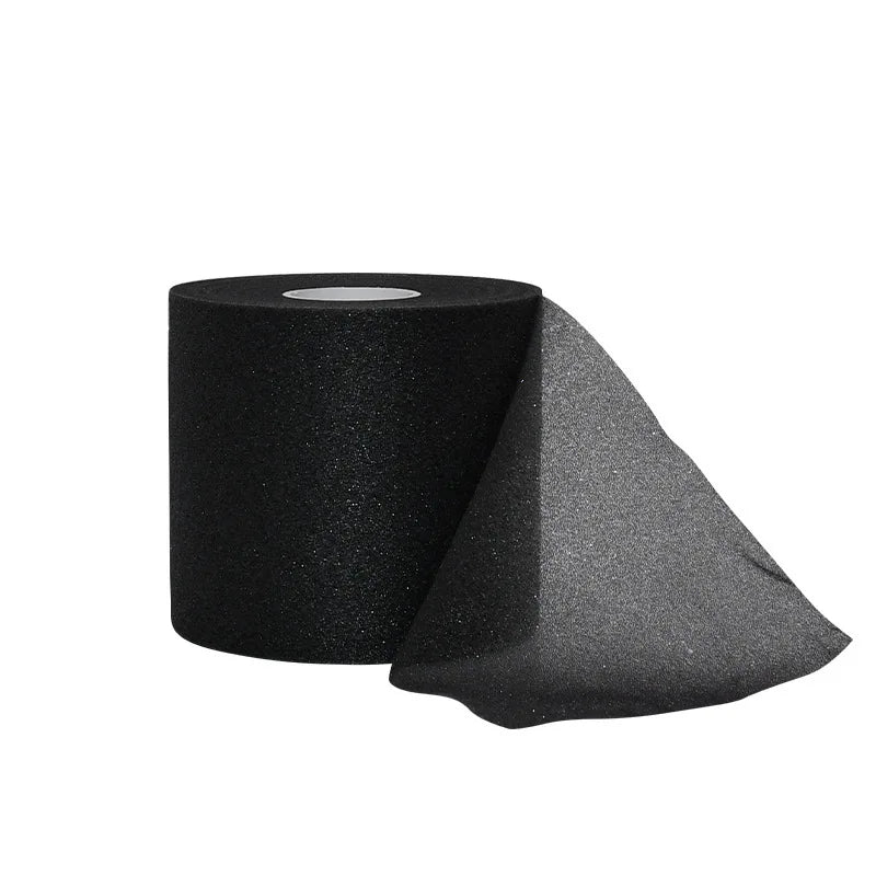 Roll of black protective foam athletic tape wrap viewed at an angle