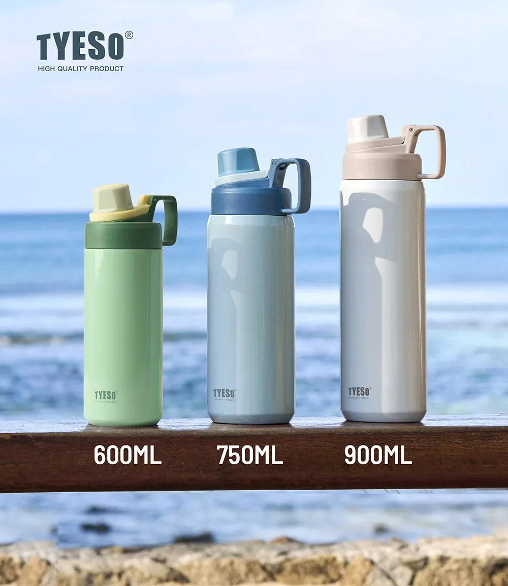 Three TYESO insulated stainless steel water bottles in green, blue, and white colors displayed outdoors.
