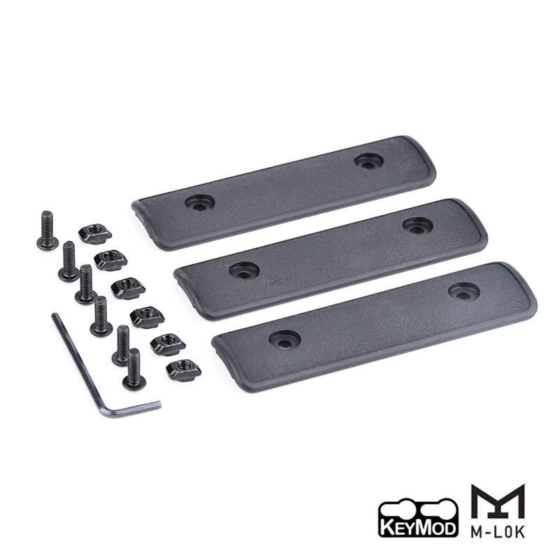 A set of black tactical rail panels and mounting hardware for airsoft guns.