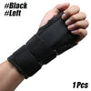 A hand is holding a black wrist support splint, showing the left side of the device.