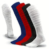 A stack of durable knee-high sports socks in white, blue, and red colors.