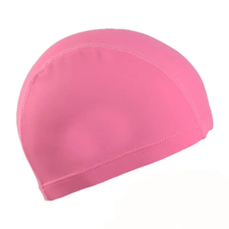 A bright pink ultra-thin nylon swimming cap shown from the side.