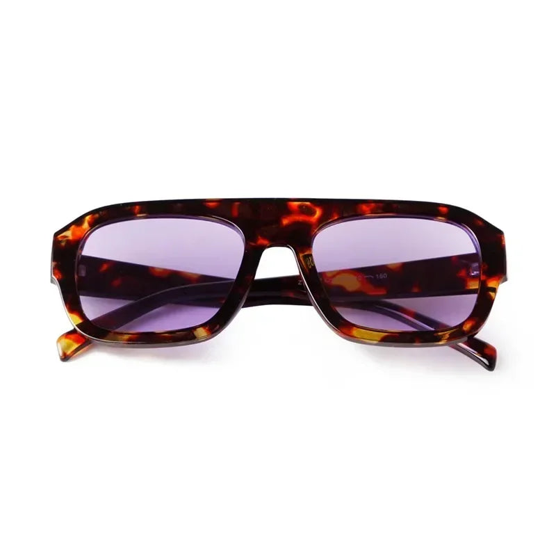 Vintage oversized square sunglasses with a tortoiseshell pattern frame.