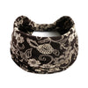 A black and white floral patterned stretch fabric headband